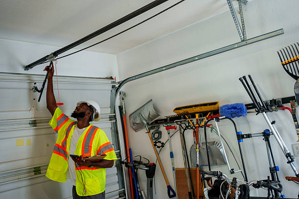 Professional Garage Door Panel Replacement technician working in Colona, IL